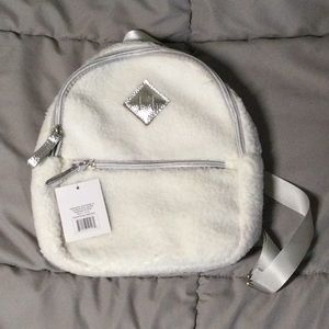 mini white fluffy backpack